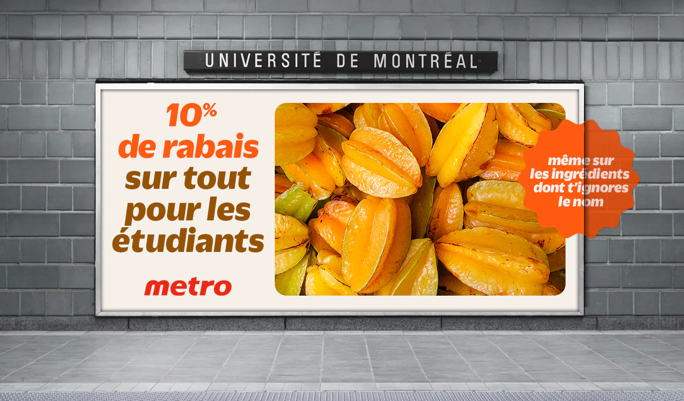 Quai de la station Université-de-Montréal : grande affiche « 10 % de rabais sur tout pour les étudiants » avec des caramboles et la pastille « même sur les ingrédients dont t’ignores le nom », logo Metro